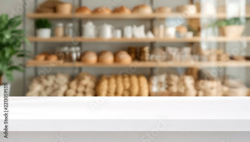 Bread shop and pastry shop interior with wooden white counter and display shelves, bread and baked goods, spacious empty composition with advertising copy space
