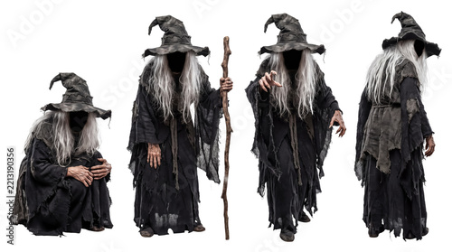 Four old witch figures in ragged black dress, pointed hat, staff
