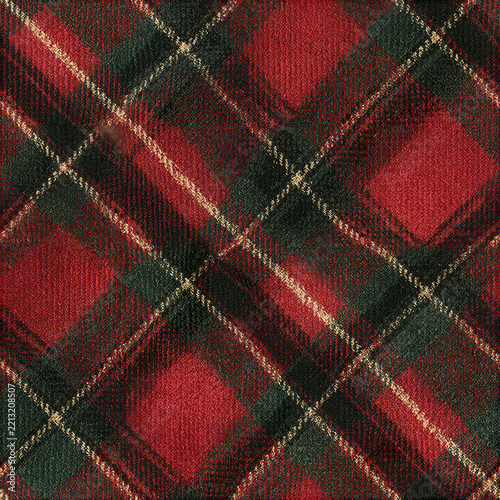 Traditional Christmas tartan seamless pattern with red and green diagonal plaid design creating cozy festive feeling