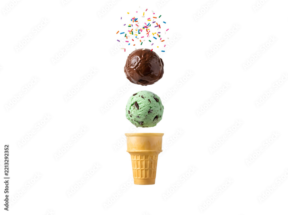 Fototapeta premium .Ultra-realistic deconstructed floating ice cream cone with mint chocolate chip, dark chocolate fudge, waffle cone, and rainbow sprinkles on a white background.