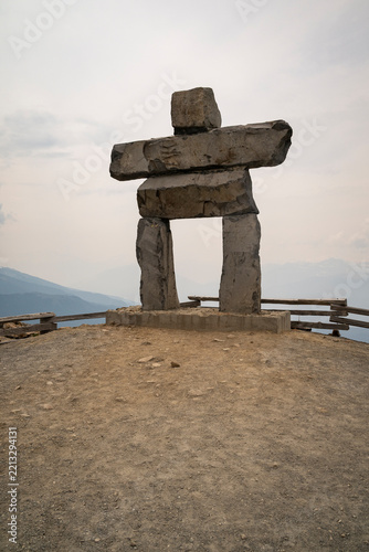 Inukshuk old historic rock monument on top of Whistler Mountain