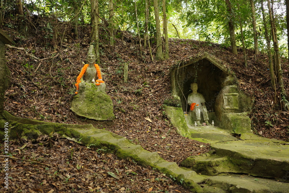 Fototapeta premium Weathered statues at the Secret Buddha Garden on Koh Samui