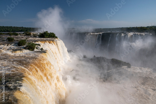 Beautiful view to Iguazu Falls waterfalls and green rainforest