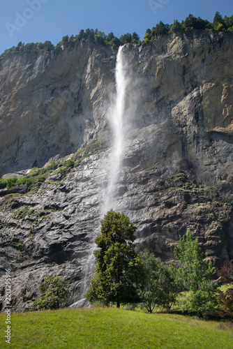 Staubbach falls dropping from cliff in lauterbrunnen valley