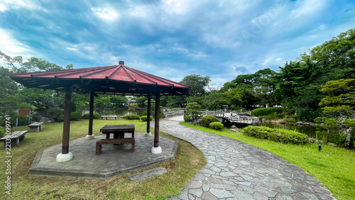 Fotografie Omura Park surrounded by ponds and greenery in Nagasaki