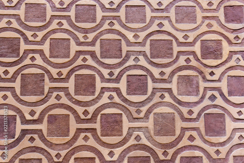 Fragment of wall with geometric pattern made with sgraffito technique