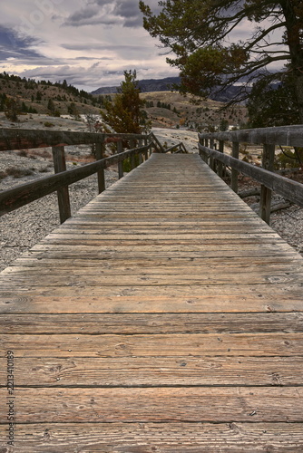 Lower Terraces Trail in Mammoth Hot Springs series of wood boardwalks; straight tract pointing right to the concession area. Yellowstone NP-WY-USA-021