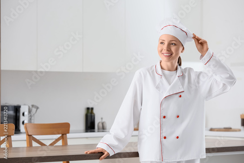 Culinary career and professional cooking, smiling female chef in uniform stan...