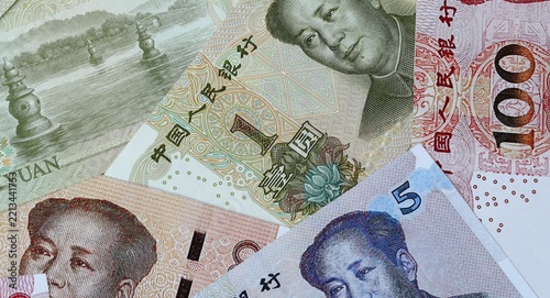 Photography Chinese yuan money bills in pile on table