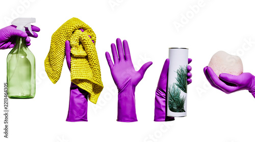 Isolated hands in purple gloves holding household cleaning items for domestic chores and hygiene