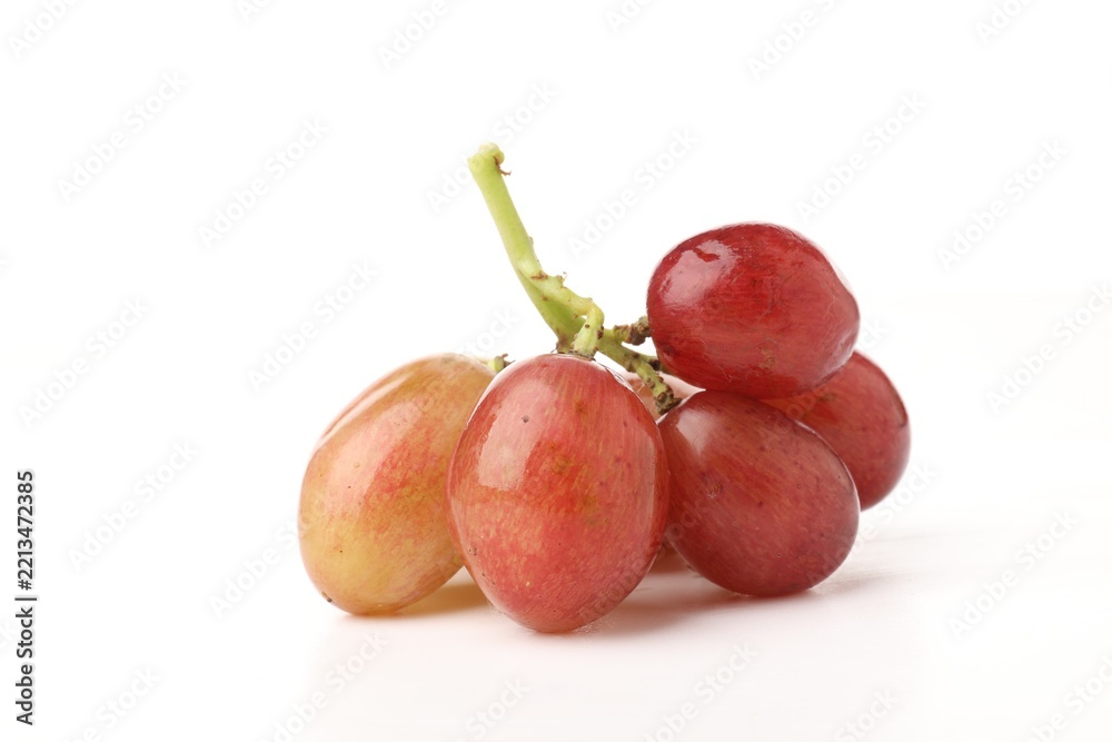 Fototapeta premium Bunch of fresh ripe grapes on white background