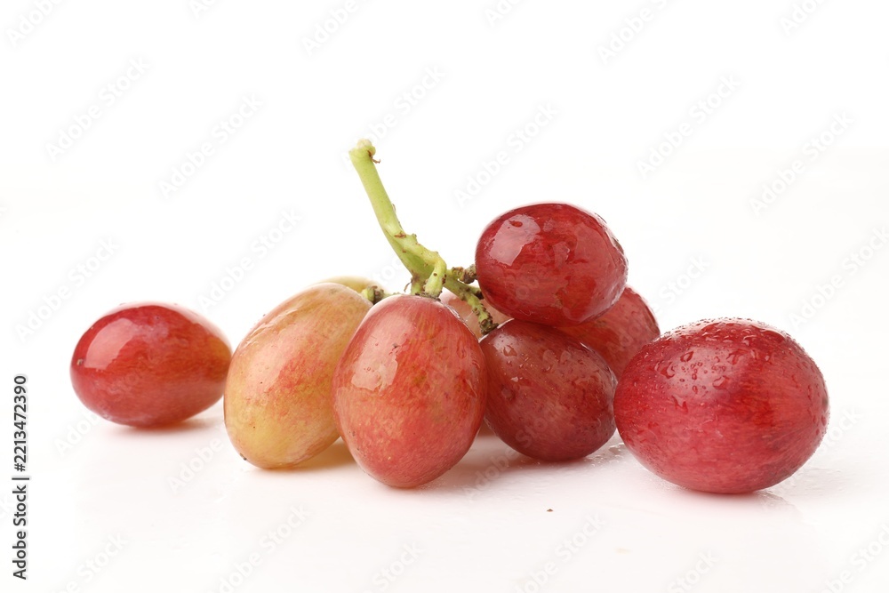Fototapeta premium Bunch of fresh ripe grapes on white background