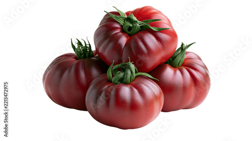 Isolated ripe heirloom dark red purple ribbed tomatoes piled up fresh vibrant organic produce