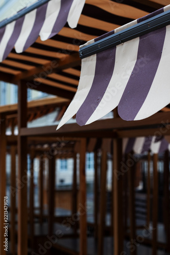 Empty Colorful Market Stalls in the Rain. Close-up.