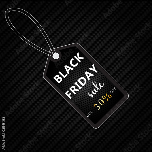 Black Friday sale tag with thirty percent off offer on dark textured background