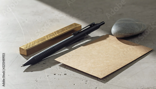 Close Up of Minimal Stationery Set on Polished Concrete Surface
