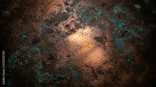 Abstract texture of aged weathered copper metal sheet with green oxidation patina weathered oxidation corrosion background metallic verdigris industrial