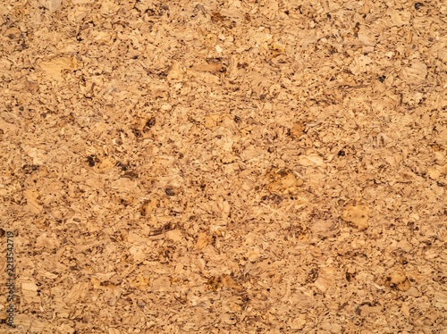 Detailed macro texture of pressed natural cork board surface