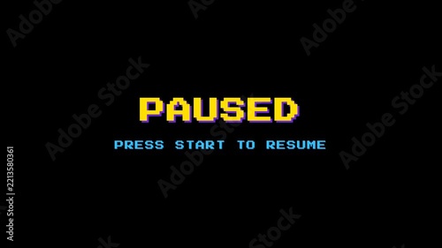 Retro paused text with press start to resume message in yellow and cyan pixel style for arcade game design