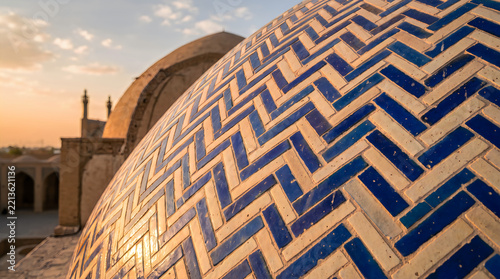 Ramadan mosque dome with blue tile patterns at sunset