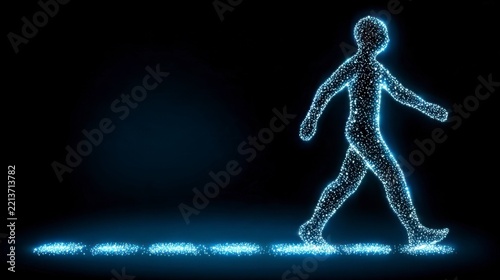 Glowing digital human figure walking on particle trail in the dark