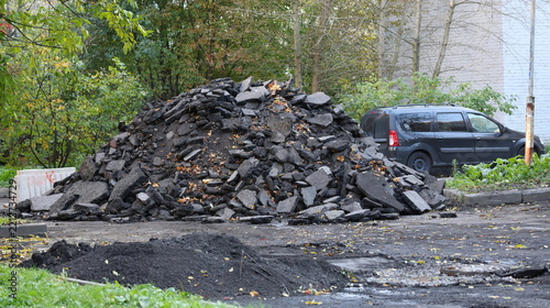 Obraz na plátně A large pile of broken asphalt in the yard