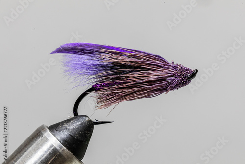 Marabou muddler hilton fly on a tying vice ready to take fishing for steelhead
