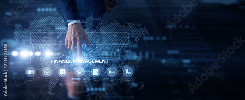 A Finance Management director operates a digital touch interface. Managing Finance Management assets on a digital world map, driving strategic investment growth around the world.