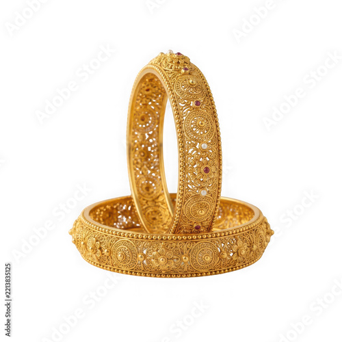 Traditional indian gold bangles with intricate filigree work isolated on transparent background