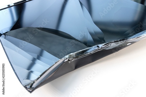 Damaged flat screen television with a shattered panel display
