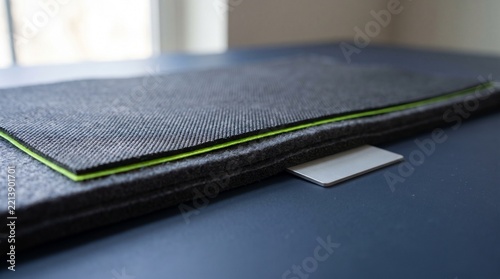 Layered conductive textile edge for wearable material design
