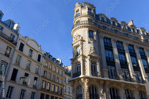Ornate Art Nouveau corner tower building with rounded bay windows and carved reliefs, 2nd arrondissement, Paris, France