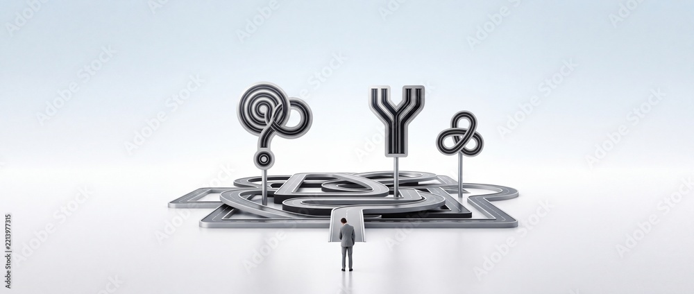 Fototapeta premium Businessman standing before a complex road maze with symbols of question mark and fork in the road representing business strategy, decision making, and career challenges in a minimalist studio