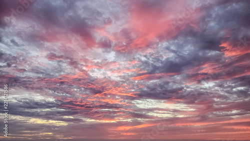 Dramatic Sunset Sky with Vibrant Pink Clouds and Twilight Gradient