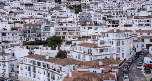 Dense whitewashed residential buildings on the hillside of Mijas, Andalusia, Spain