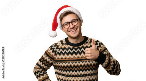 Young man in Santa hat and sweater giving a thumbs up isolated cutout
