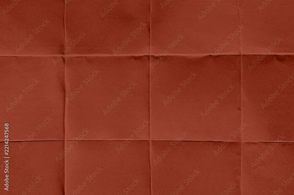 Fototapeta premium Abstract red quilted fabric texture background with soft folds