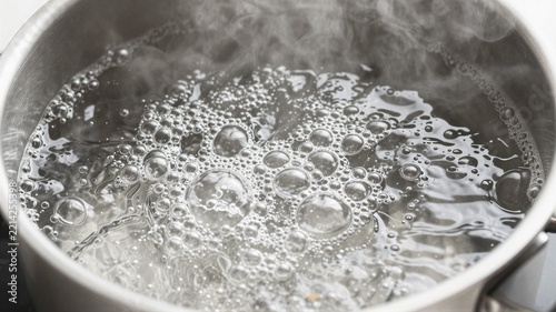 Boiling Water Bubbles in Stainless Pot