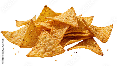 Crispy seasoned tortilla chips piled together, isolated on transparent background