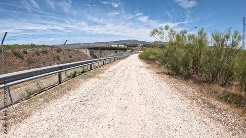 Via de la Plata, a gravel road along the railway near Embalse de Alcantara, province of Caceres, Extremadura, Spain