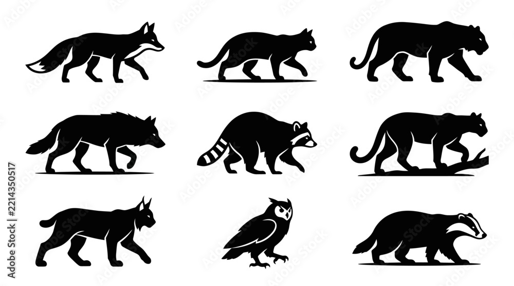 Fototapeta premium Black silhouettes of various wild animals.