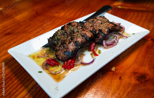 Gluten free Greek food, Loukaniko grilled Greek sausage, onions, peppers.