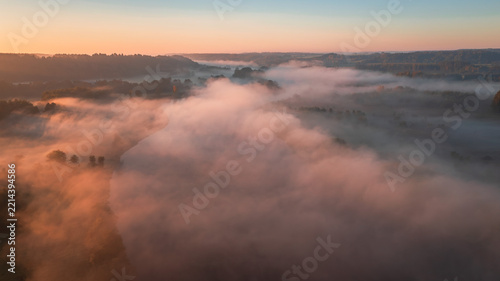 Autumn Morning Fog Over Countryside Fields at Sunrise Golden Misty Landscape