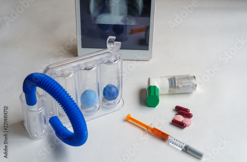 Inhalation Device and Medicine on White Table
