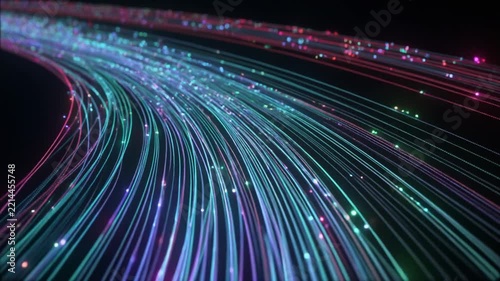Abstract flowing lines of vibrant multicolored light trails illuminate a dark expanse, suggesting rapid data transmission and futuristic technological pathways