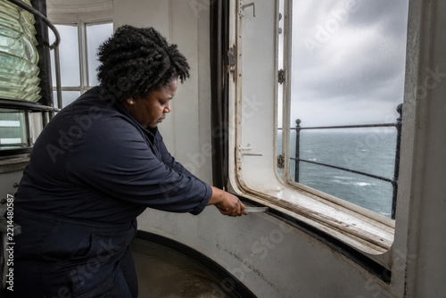 Lighthouse Maintenance - Facilities Engineer Reseating Coastal Beacon Hatch Gasket