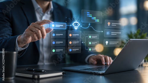 Businessman using laptop and interactive digital interface with artificial intelligence for software development and business automation