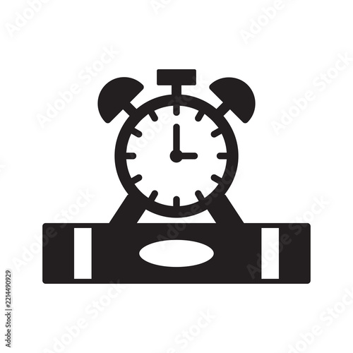 Alarm clock on book study time icon