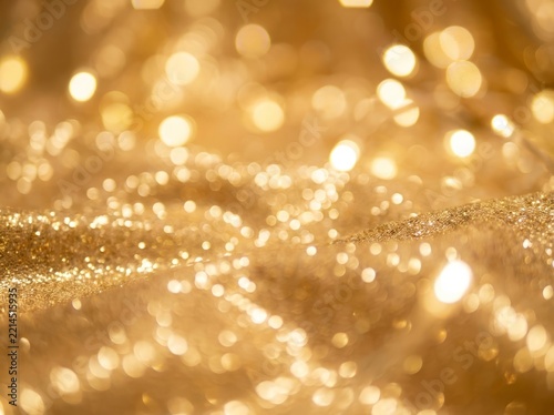 Close up Golden Glitter Bokeh Texture with Shimmering Light.