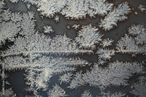 Close-Up of Frost Crystals on Window Surface Capturing Winter's Natural Beauty